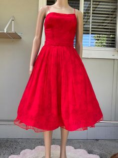 Wow.  An original red silk dress from this iconic USA label.  Back from the cleaners this dress is in very very good condition.  Not for the feint hearted. This is a beautiful shade of real red., pure silk with the teeniest shoulder straps.  Red silk with very faint large floral self pattern Lined Spaghetti shoulder straps Metal rear centre zip fastening. Works well.  Full skirt Photographed over a 26" red crinoline to show the fullness of the skirt, any serious fashionista that likes to include Red Silk Dress, Red Silk, Full Skirt, Fit And Flare Dress, Flare Dress, Silk Dress, Dress Clothes For Women, Fit And Flare, Halloween Shopping