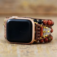 This Cool Beads Apple Watchband will lend a touch of sophistication and luxury to your accessories collection. Crafted from fine gemstone beads, its brown hue is time-honored and classic, creating a timeless piece that will last. Elevate your look with this elegant, exclusive accessory. Material: Picasso Jasper, Crystal, African Turquoise, Black Agate, Matel, S. Steel. 100% New and Exquisite Quality Size: 3 sizes. small-48cm（wrist<6.5"）/medium-53cm (6.5"7.2"), with 3 closures to adjust the lengt Beaded Watch Bands, Apple Watch Bracelets, Natural Bohemian, Bracelet Apple Watch, Power Stone, Picasso Jasper, African Turquoise, Chakra Jewelry, Electronic Gadgets