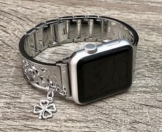 High Quality Premium Shiny Silver Color Band for Apple Watch All Series Comfortable Bangle with Secure Clasp Lock, Includes Extra Links and Pins Tool to Resize Wristband To Preferred Fitment Adjustable Size Fits 5.5 to 8 Inches (need to add or remove extra links) Super Light Bracelet - Weighs Around 1.2 oz 18mm Wide, Designed And Handmade by Simeon D Jewelry Not For Other Models. Tracker Is NOT Included Follow my Studio for Updates & New Designs Silver Rectangular Watch Accessories For Gifts, Silver Rectangular Watch Accessories As Gift, Trendy Stainless Steel Watch Band Gift, Trendy Silver Watch Bands As Gift, Rectangular Silver Watch Accessories For Gifts, Silver Stainless Steel Watch Bands As Gift, Adjustable Stainless Steel Watch Accessories As Gift, Metal Bracelet Watch Bands As Gift, Silver Stainless Steel Watch Band As Gift