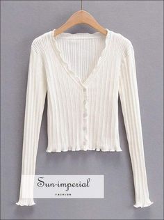 Sun-imperial Women White V-neck Ribbed Knit Cardigan with Ruffle Trims detail Basic style, chick sexy street vintage style SUN-IMPERIAL Winter V-neck Top With Ruffles, Ribbed Cotton V-neck Cardigan, V-neck Ruffled Cardigan For Layering, Spring V-neck Ruffled Sweater, V-neck Ruffled Sweater For Fall, Cotton V-neck Ribbed Cardigan, Casual Long Sleeve Ruffle Cardigan, White Ribbed V-neck Cardigan, Trendy Fall Cardigan With Ruffles