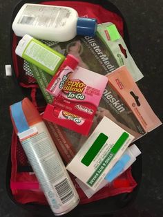 the contents of a travel bag are neatly packed