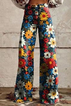 Make a bold statement with these Women's Colorful Flower Print Wide Leg Jeans. The vibrant floral design adds a playful and energetic touch to your outfit, perfect for expressing your individuality. Embrace the joy of color and style with these casual pants that are sure to turn heads wherever you go. Multicolor Wide Leg Pants With Floral Print, Multicolor Floral Print Wide Leg Pants, Yellow Floral Print Long Pants, Multicolor Floral Print Wide Leg Bottoms, Multicolor Floral Print Pants For Spring, Spring Multicolor Print Cotton Bottoms, Yellow Floral Print Cotton Bottoms, Spring Multicolor Floral Print Pants, Green Cotton Bottoms With Floral Print