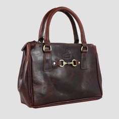 * H: 22cm W: 10cm L: 28 cm.  * Crafted from Buffalo Leather.  * Carry handles for ease.  * An adjustable and detachable shoulder strap.  * Embossed at the front with the Grays 1922 Logo and Snaffle Bit Fitment.  * There is a large main compartment with 2 side pockets - one with a zip.  * Top fastens with a magnetic clasp.  * Fully lined with the Grays 1922 logo print canvas.  * On the front and back of the bag there are 2 zipped compartments.  * Zips fitted with Grays 1922 embossed leather pulls Snaffle Bit, Gray Handbags, Buffalo Leather, Leather Pulls, Natural Leather, You Bag, Embossed Leather, Logo Print, Travel Bags