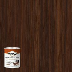 a can of brown wood stain sitting on top of a table