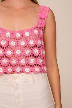 A delightful crochet top adorned with beautiful flower, trimmings, featuring a charming square, neckline and elegantly sleeveless design. Wear over a bathing suit at the beach to a festival or vacation. Pair with white wide leg jeans or shorts. Spring Beach Crop Top With Square Neck, Spring Tank Top With Square Neck, Summer Tank Top With Square Neck For Spring, Spring Beach Tank Top With Square Neck, Square Neck Tank Top For Beach, Summer Cotton Crop Top With Square Neck, Spring Cotton Tank Top For Beachwear, Floral Print Square Neck Top For Beach, Square Neck Crop Top For Spring Vacation