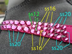 a pair of shoes with pink crystals on the soles and price tags for each shoe