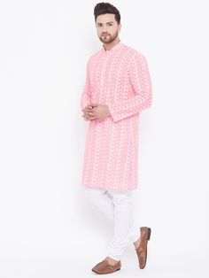 VASTRAMAY Pink Pure Cotton Kurta Chikankari Pyjama Baap Beta Set A stunning addition to your ethnic wardrobe, this pink pure cotton kurta set with intricate chikankari work is perfect for special occasions. Key Features: Color: Pink Fabric: Pure Cotton Design: Chikankari Set Includes: Kurta and Pyjama Specifications: Available Sizes: S, M, L, XL, XXL Occasion: Festive, Party Wash Care: Hand Wash or Dry Clean Only Material & Care: This kurta set is made of pure cotton, ensuring comfort and breath Bollywood Style Pink Cutdana Kurta, Pink Cutdana Bollywood Kurta, Pink Long Sleeve Traditional Wear With Chikankari Embroidery, Pink Sherwani For Spring Festivals, Pink Straight Kurta With Cutdana, Pink Sherwani With Chikankari Embroidery And Long Sleeves, Pink Embroidered Sherwani Straight Kurta, Pink Bollywood Sherwani With Chikankari Embroidery, Bollywood Pink Sherwani With Chikankari Embroidery