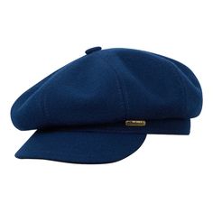 a blue hat is shown against a white background and has a gold badge on it