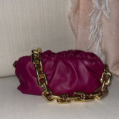 Absolutely Stunning Bottega Veneta Chain Pouch In Cinnabar/Gold. Guaranteed Authentic, From Nordstrom. This Is A Rare, Sold Out Color. It’s A Gorgeous Shade Of Raspberry Red. Bottega Veneta Updates Its Cult Leather Bag With A Chunky Chain Strapeach Link Is Sculpted Individually Before It's Assembled And Polished By Master Jewelers. A Magnetic Frame Enveloped In Folds Creates The Soft, Voluminous Shape, Combining The Brand's Heritage Craftsmanship With A Contemporary Sensibility. Magnetic Frame C Designer Gold Clutch With Chain Strap, Luxury Shoulder Bag With Gold Chain For Party, Luxury Shoulder Bag With Chain As Gift, Luxury Purple Clutch For Evening, Luxury Chain Link Shoulder Bag For Formal Occasions, Luxury Chain Pouch Bag, Luxury Bags With Gold Chain For Party, Luxury Purple Shoulder Bag With Chain Strap, Luxury Gold Clutch With Chain