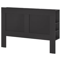 a black headboard with two open shelves on each side and one closed shelf at the top