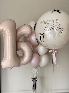 the balloons are in the shape of the number fifteen