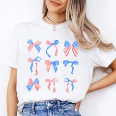 Cozy oversized Comfort Colors T-Shirt with USA Bows Coquette Graphic - perfect for the Fourth of July, or Memorial Day! FEATURES * Comfort Colors - 6.1 oz., 100% ringspun cotton t-shirt * Preshrunk, soft-washed, garment-dyed fabric * Design is printed with water-based ink on a white tee * Printed with a direct to garment printer (DTG) - ink is printed into the fibers of the fabric for long-lasting wear that never fades! * Fast shipping (3-5 business days) * Beautifully packaged, and ready to gif Cute Cotton T-shirt For 4th Of July, Cute American Flag Print Short Sleeve T-shirt, Cute Short Sleeve Tops For Independence Day, Cute Cotton Independence Day Top, Cute Cotton Top For Independence Day, Cute Crew Neck Shirt For 4th Of July, Cute Independence Day T-shirt With Graphic Print, Cute Independence Day Graphic Print T-shirt, Cute Independence Day Graphic T-shirt