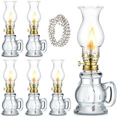 an assortment of glass oil lamps with gold accents