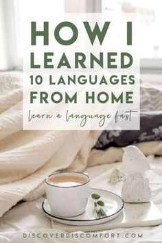 a cup of coffee sitting on top of a white plate next to a book with the title how i learned 10 languages from home