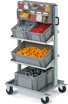 three bins are stacked on top of each other with different types of items in them