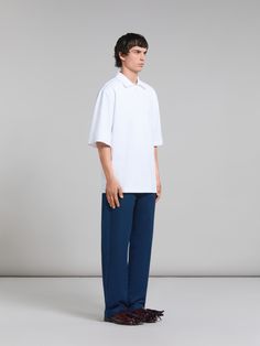 Oversized polo shirt made from compact organic cotton jersey. Button placket. Embelished with tonal Marni patches on the sleeve. Oversized Collared Cotton T-shirt, Modern Relaxed Fit Polo Shirt, Modern Cotton Polo Collar T-shirt, Modern Cotton Polo Shirt With Relaxed Fit, Modern Cotton Shirt With Polo Collar, Modern Relaxed Fit Cotton Polo Shirt, Modern Collared Cotton T-shirt, Oversized Polo Outfit, Oversized Polo Shirt