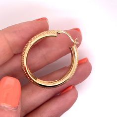 Vintage 1990's 14k yellow gold half pair mesh pattern hoop earring. The earring weighs 2.62 grams of gold. The height of the earring is 1.25 inches. The width of the earring is 1.15 inches. Note - this is a half pair of earrings. There is no matching earring available. Textured Small Hoop Yellow Gold Earrings, Formal Textured Yellow Gold Jewelry, Textured Gold-plated Hoop Earrings, Textured Gold-plated Yellow Gold Jewelry, Textured Gold Plated Yellow Gold Jewelry, Textured Gold Plated Hoop Earrings, Textured 14k Yellow Gold Jewelry, Textured Yellow Gold-plated Jewelry, Textured Yellow Gold Plated Jewelry