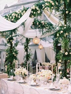 an instagram photo with flowers and greenery on the table for a wedding reception