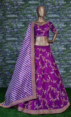 This elegantly designed bridal wedding Sabyasachi designer lehenga in dual-tone mulberry silk is further enhanced with badla, sequins, thread, and dori work all over.
Accompanied by a matching embellished Mulbury Silk choli along with matching white purple stripes printed khadi Organza dupatta which adds ease to the final look.
the lehenga and choli making it look mesmerizingly beautiful. This lehenga is semi-stitched and can be customized up to 42 sizes. Purple Chanderi Anarkali Set For Reception, Purple Silk Sharara For Navratri, Purple Chanderi Sharara For Reception, Purple Art Silk Sharara With Dori Work, Purple Floor-length Traditional Wear For Navratri, Purple Silk Sets For Reception, Purple Chanderi Sharara With Pallu, Purple Silk Sharara With Pallu, Purple Chanderi Lehenga For Reception