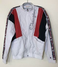 Champion Premium Reverse Weave Vintage Track Jacket Size XS.  Made in Vietnam  Shell: 100% Polyamide  Lining: 100% Polyester  Machine wash, tumble dry  Pre-owned in great condition  Full Zipper  Embroidery in great condition  2 Front Pockets  Length 24" Width 20" Pit to Pit 20.5" Shoulder to Shoulder 22" Sleeve Length 23" (Measurement take while item was laying down)  FridaFinds9 Policies:  -No returns accepted.  -We encourage all buyers to ask questions before they buy. We are more than happy t White Urban Track Jacket For Gym, Urban Style White Track Jacket For Gym, White Urban Style Track Jacket For Gym, Functional White Sweatshirt For Streetwear, Sporty Long Sleeve Windbreaker For College, Sporty Long Sleeve College Windbreaker, Functional White Streetwear Sweatshirt, White Crew Neck Outerwear For Sports Season, Casual White Outerwear For The Gym