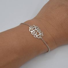 "Silver Monogram bracelet-Sterling silver monogram jewelry-Handmade Christmas gift for Sister This Personalized Monogram Bracelet is one of the most special and personal pieces of jewelry you can own or give as a gift. Please choose 1-3 letters you like and I will create your unique monogram.It can be your initials (usually with the family name in the center),or the initials of those most special to you. HOW TO ORDER: Step 1: Select color and Wrist Size. Step 2: Please write specify the \"initia Sterling Silver Initials Bracelet For Personalized Gift, Personalized Sterling Silver Initials Bracelet, Classic Initials Bracelet, Perfect As Gift, Classic Monogram Jewelry For Gifts, Personalized Silver Bracelets With Initials, Classic Monogram Name Bracelet As Gift, Personalized Silver Bracelet With Initials, Elegant Silver Name Bracelet Hypoallergenic, Elegant Hypoallergenic Silver Name Bracelet