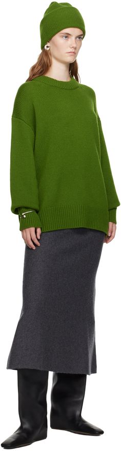 5-gauge and 535 g knit GOTS-certified organic cashmere sweater. · Rib knit crewneck, hem, and cuffs · Dropped shoulders · Extended sleeves Supplier color: Matcha Green Cashmere Sweater With Ribbed Cuffs, Green Sweater With Ribbed Cuffs For Work, Hammered Bracelet, Lisa Yang, Open Cuff Bracelet, Lipstick Bag, Chain Strap Bag, Floral Shoes, Fringe Skirt