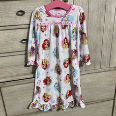 Disney Girls Size 4. White Nightgown With Princess Print. Never Worn But Has Been Washed. Princess Nightgown, Princess Nightgowns, 4 Princess, White Nightgown, Girls Nightgown, Disney Pajamas, Gowns For Girls, Ruffle Long Sleeve, Sewing Skills