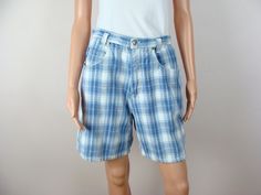 "Vintage Fresno plaid jean shorts from the 90s.  Feature a 1.5\" fitted waistband with 5 belt loops, a branded metal button and 6\" fly front zipper closure.  Has longer length legs with two front side pockets and two back patch pockets and the brand patch on the back.  Looks great worn long or cuffed on the ends for a shorter short look.  Freshly laundered and ready to wear. Label: \"Authentic Fresno The Jean Company\".  Made in Sri Lanka. Fiber Content: 100% Cotton. Stamped Size: 11/12.  Pleas Shorts Grunge, Shorts Preppy, Plaid Jeans, Shorts High Waisted, Vintage Plaid, High Waisted Shorts Denim, Long Shorts, Back Patch, Long A Line