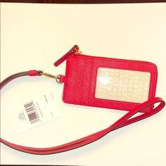 Red Hot Chili Colored. Id Holder, Card Case 3'' W X 5.5'' H 15'' Removable Leather Lanyard Nylon / Saffiano Leather Lined Zip Closure Interior: Two Slip Pockets Exterior: One Clear Id Pocket, Two Card Slots Red Rectangular Card Holder With Zipper Closure, Red Rectangular Card Holder With Zipper, Kate Spade Rectangular Card Holder With Card Slots, Red Kate Spade Wallets For Everyday Use, Red Rectangular Card Holder With Interior Slots, Red Card Holder With Card Slots For Travel, Leather Lanyard, Red Card, Hot Chili