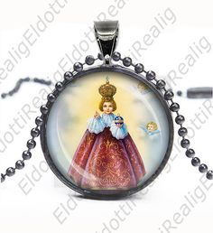 Infant JESUS of Prague Catholic Necklace. Gun Black by ElDotti Black Round Pendant Necklace Collectible, Miraculous Medal Pendant Gift, Miraculous Medal Pendant Necklace For Memorials, Collectible Miraculous Medal Round Pendant, Silver Miraculous Medal Pendant, Infant Of Prague, Catholic Necklace, Spiritual Jewelry: Our Lady Of Guadalupe Round Pendant, Holy Rosary