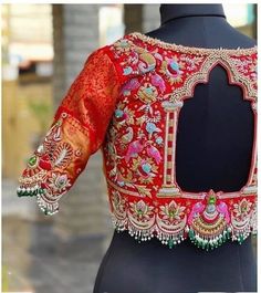 Here Are The Latest Designs For Bridal Blouses With Maggam Work. The Maggam Work With Kundan, Thread And Spring Can Be Customised Along With The Cloth Color You Want To Choose. Having These Kind Of Maggam Work Blouses Is Very Trendy For Traditional Gatherings And Poojas.  This Enhances The Beauty Of Any Saree When This Is Teamed Up With Different Kind Of Maggam Designs. The Combination Of Aari And Zardosi Works Make This Maggam Designs Look Very Elegant And Beautiful. We Customize The Blouse As Per Your Measurements And The Preferred Colours. You Just Have To Share The Saree Colour And We Will Take Care Of Everything. Disclaimer: Colour May Slightly Vary Due To Photography Effects And Screen Resolution. We Do Our Best To Reach Your Expectation As We Understand The Pulse Of Our Customers. Embroidery Blouse Saree, Blouse Designes, Blouse Inspiration, Paithani Blouse, Khatli Work, Magam Work, Silk Saree Blouse Designs Patterns, Latest Bridal Blouse Designs, Maggam Work Blouse