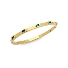 The Emerald Skinny Bangle, a sleek gold bracelet featuring six evenly spaced emerald-cut green gemstones set around its circumference. This minimalistic yet elegant bangle adds a refined touch of color and sophistication, perfect for stacking or wearing alone as a subtle statement piece. Stone Bangle, Work Fashion, Emerald, 18k Gold, Gold Plate, Bangles, Plating, Stainless Steel, Stone