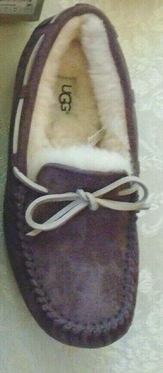 These are Women's UGG Dakota slippers in port, size 5. The Dakota is crafted with a rubber outsole to travel both indoors and out. This is one of UGG's best-selling slippers. These slippers have a leather corded lace with fixed bow. They are made of suede and have UGGpure wool linings and insoles. MSRP is $99.95. *************NOTE: THE SIZE 5 PORT COLOR DO NOT HAVE AB BOX!!!************* Ugg Dakota Slippers, Ugg Dakota, Corded Lace, Womens Uggs, Leather Cord, Womens Flip Flop, Slippers, Wool, Lace