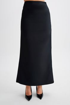 Maximum suiting.The MICAH Suiting Maxi Skirt epitomises timeless sophistication with a modern twist. Designed with a high waist and straight shape, it exudes effortless elegance. Its maxi length ensures a graceful silhouette for any occasion. Enhanced with contrast mock pocket detailing, side zipper, and centre back vent, this skirt offers both style and functionality. Whether paired with a blouse for a polished office look or the matching Micah Contrast Suiting Strapless Top, for a chic evening Makeup Wishlist, Effortless Elegance, New Wardrobe, Skirt Black, Modest Outfits, Side Zipper, Strapless Top, Ball Gowns, Maxi Skirt