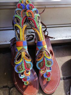 100% handmade using leather and fine beads. Masai beaded sandals are made using the pure original leather and quality African beads.They are inspired by the Masai community They are perfect for any occasion. True to size. We ship worldwide. Feel free to send me a convo for any clarifications Beaded Leather Sandals, Beaded Sandals, Maasai, African Beads, Summer Sandals, Bead Leather, Sandals Summer, Strappy Sandals, Gladiator Sandals