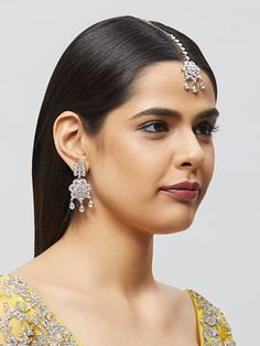 Beautiful kundan earrings with stones and pearls, plus matching mang tikka Traditional Indian Jewelry: Slight Color variations are possible due to lighting and photography. If you are interested in purchasing this item and have any additional questions about this item, please feel free to email us at nazranaanj@gmail.com. For faster responses, call us at 732-283-1808 or WhatsApp us at 609-852-9922 Care instructionsKeep Jewelry away from direct heat, water, perfumes, deodorants and other strong - Elegant Danglers For Puja, Traditional Kundan Necklace With Matching Earrings, Elegant Bridal Earrings With Latkans For Puja, Elegant Bridal Earrings For Diwali Puja, Kundan Earrings For Puja, Elegant Meenakari Danglers For Puja, Elegant Meenakari Tikka For Puja, Silver Kundan Pearl Earrings With Stone Work, Silver Traditional Pearl Earrings With Stone Work