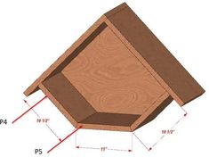 a wooden bird house with measurements for the top