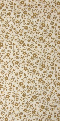 a white and brown fabric with small flowers on it