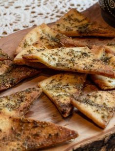 small pieces of bread on a wooden cutting board