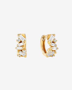 Crafted in 18-karat, these 'Frenzy' huggies feature a dazzling blend of baguette and round white diamonds. Comfortably designed for daily wear, these huggies are ideal for layering. Details 18k yellow gold, rose gold or white gold 0.70 carats of baguette and round white diamonds 12mm diameter 5.5mm width Ref: BAE918 Huggie Earrings With Baguette Diamonds For Gift, Gift Huggie Earrings With Baguette Diamonds, 14k Gold Baguette Diamond Huggie Earrings For Anniversary, Diamond Baguette Cut Huggie Earrings With Accents, Yellow Gold Baguette Diamond Huggie Earrings, Gold Baguette Cut Cubic Zirconia Huggie Earrings, Gold Cubic Zirconia Baguette Cut Huggie Earrings, Yellow Gold Huggie Earrings With Baguette Diamonds, Huggie Hoop Earrings With Baguette Diamonds In Yellow Gold