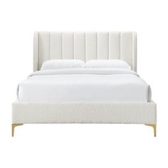 a bed with white linens and wooden legs on the headboard, against a white background