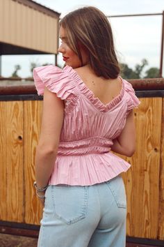 We are here for all the colors this season & this lavender top is so cute! Features a v-neck, ruffle hem & sleeve, elastic waist & raw edge. 100% Cotton Jacie is 5'4", a size 26 & 34B wearing a small Casual V-neck Ruffled Crop Top, Fitted V-neck Ruffle Crop Top, Feminine V-neck Puff Sleeve Top With Ruffles, Bohemian V-neck Blouse With Ruffles, Vogue Home, Lavender Tops, Bohemian V-neck Top With Ruffle Hem, Rodeo Drive, Ruffle Hem