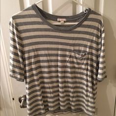 Nwot Gap Grey-And-White Striped T-Shirt. Size Sm. Soft + Stretchy With A Slightly Drapey Fit. 100% Viscose. A Little Wrinkled, But Nothing A Little Heat Can't Take Care Of :) Love The Shirt, But Need To Downsize! Gap Striped Cotton Tops, Striped Cotton Gap Tops, Gap T-shirt For Everyday Spring Wear, White Everyday Gap Tops, White Relaxed Fit T-shirt By Gap, Everyday White Gap Tops, Gap Relaxed Fit T-shirt For Spring, Casual Striped Tops From Gap, Casual Striped Gap Tops