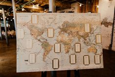 a large map is on display in a warehouse