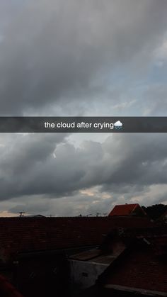 the clouds are dark and cloudy in the sky, with a sign above it that reads'the cloud after crying '