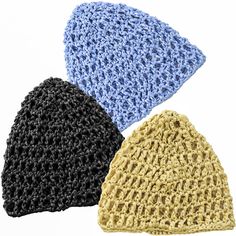 three crocheted hats on white background with one black, one blue and one yellow