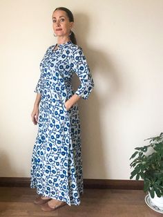 Elegant, form fitting long cotton dress with double slits, zipper closure, pockets and a lot of STYLE! Feel like a queen in this gorgeous indigo block print kurta dress! This dress is fitted around the upper body, beautifully hugs the waist and hips and allows for extra room for comfort and movement! Flattering for all shapes. This long, slim, yet roomy design is elegant and statuesque! Measurements:  Length of dress (from shoulder to floor) = 55 inches Sleeve length = 18.5 inches  US Women's S: Fitted Blue Maxi Dress With Pockets, Fitted Long Sleeve Maxi Dress With Pockets, Fitted Blue Dresses With Side Pockets, Fitted Cotton Dresses With Back Zipper, Long Cotton Dresses With Pockets, Fitted Long Cotton Maxi Dress, Fitted White Dresses With Side Pockets, White Fitted Dresses With Side Pockets, Casual Cotton Maxi Dress With Side Slits