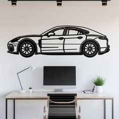 a wall decal with a car drawn on it in the shape of a sports car