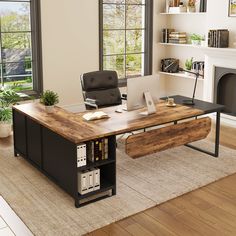 an office with a desk, chair and bookshelf in front of a fireplace