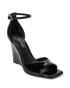 This Ankle Strap Wedge makes a bold fashion statement, with polished metallic style adding a touch of glamour to any outfit. It's a must-have open-toe shoe for both casual and formal occasions. | Nine West - Black - Ankle Strap Wedge - 8.0 Black Wedge Heels Outfit, Wedge Heels Outfit, Formal Wedges, Wedge Outfit, Bold Shoes, Metallic Style, Heels Outfits, Metallic Shoes, Ankle Strap Wedges